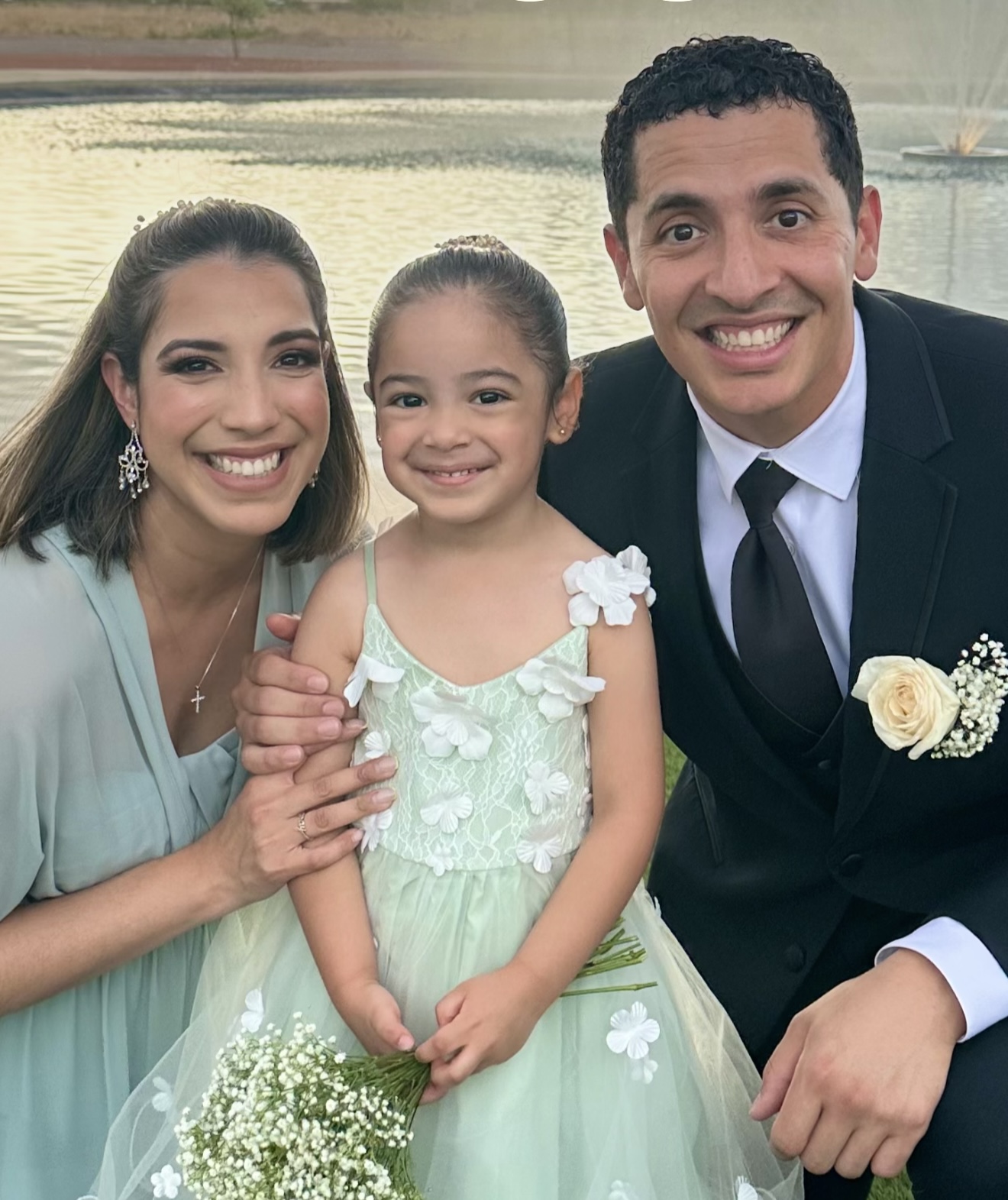 Lily with her husband and daughter