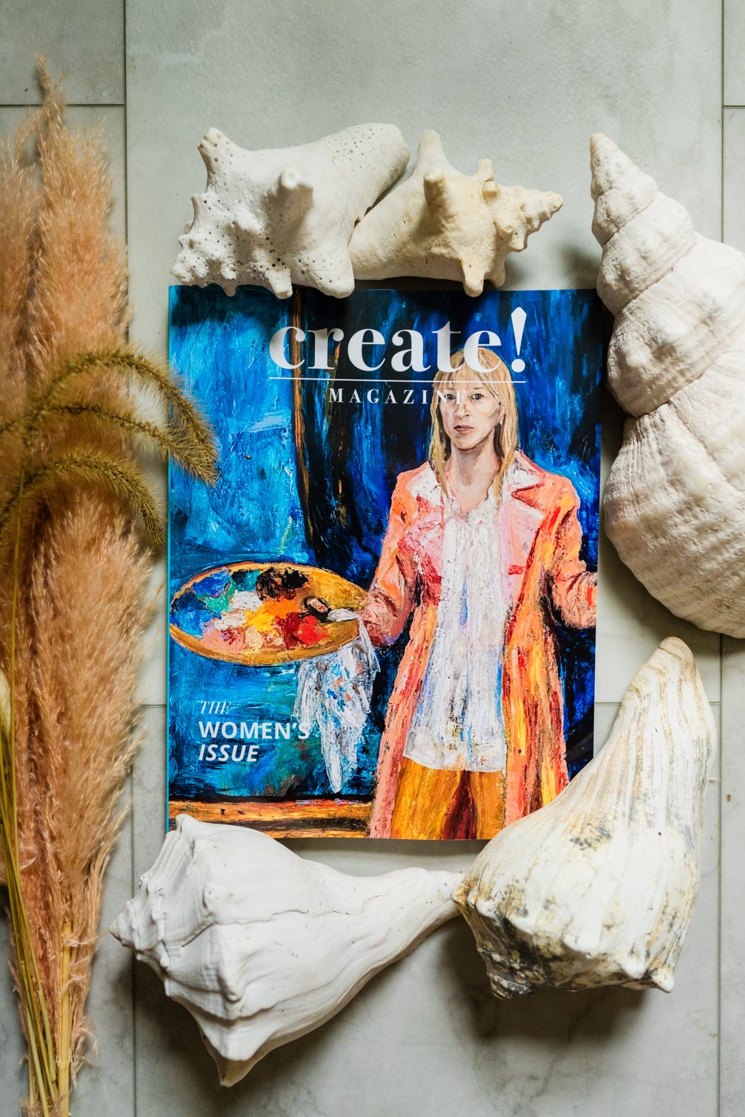 The Create! Magazine Women’s Issue with shells and dried grasses