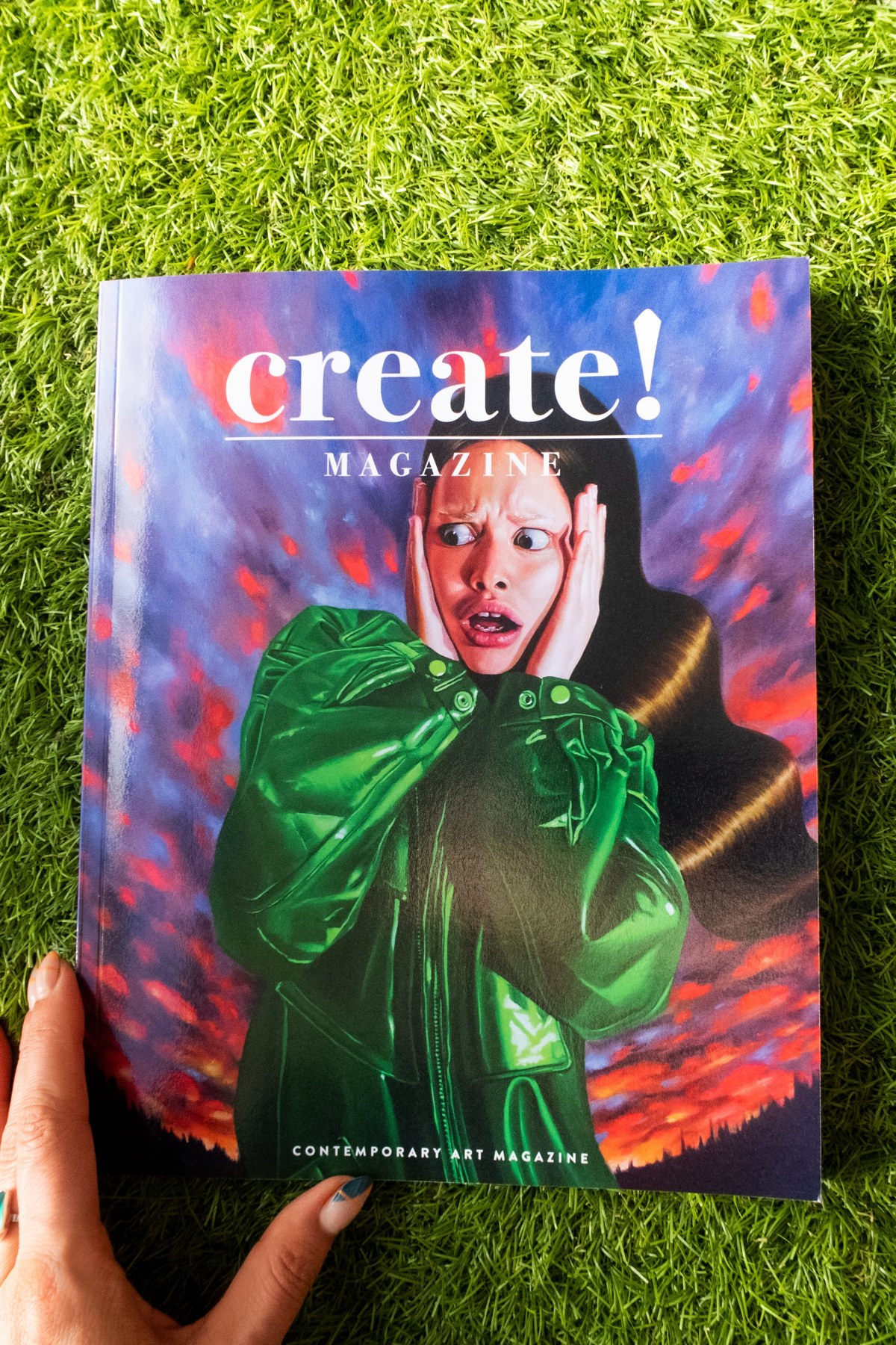 A Create! Magazine cover on the grass