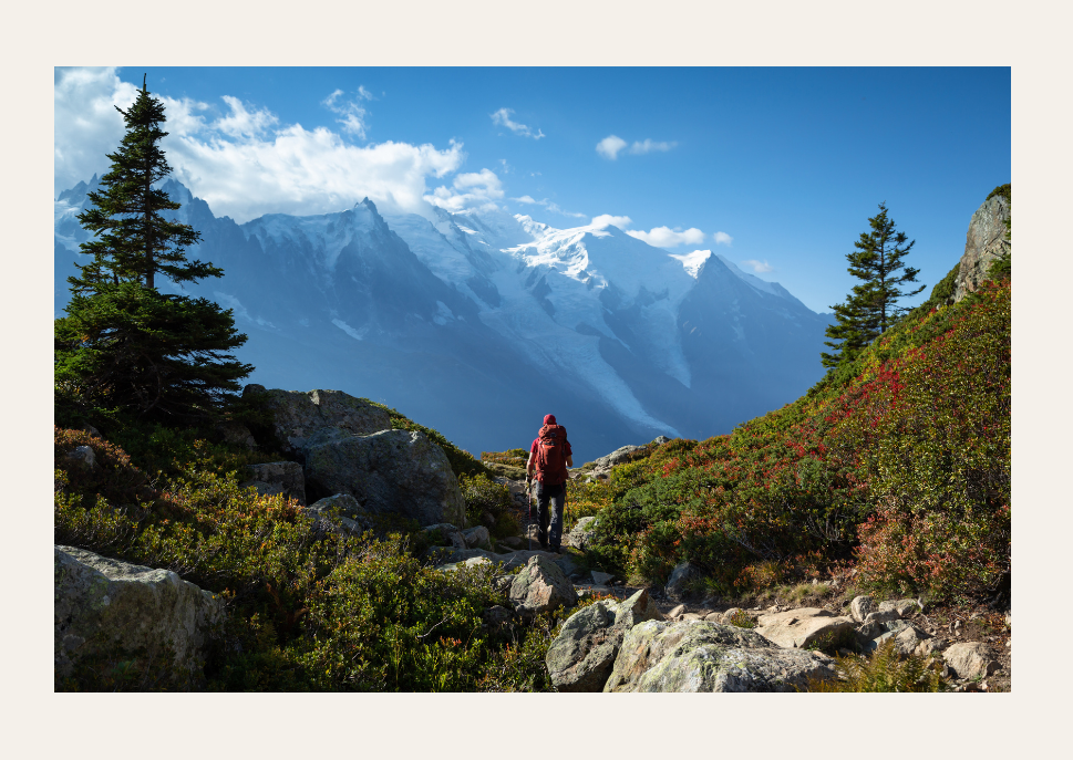 A woman hiking a trail