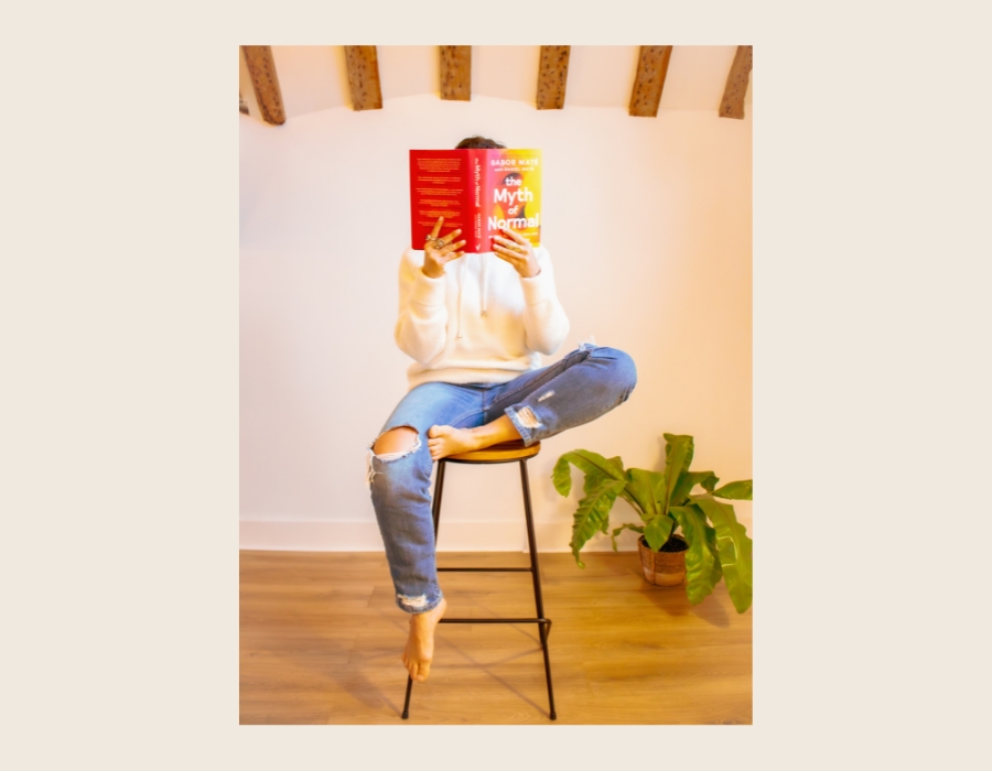 Karine Flynn reading The Myth of Normal by Gabor Maté