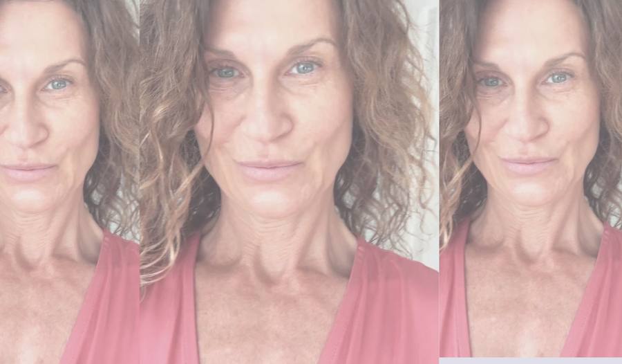 Three overlapping close-up portraits of a woman with curly hair, in a soft pink tone