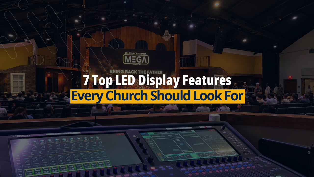 Church production mixing console with LED display screen behind the stage during a worship service