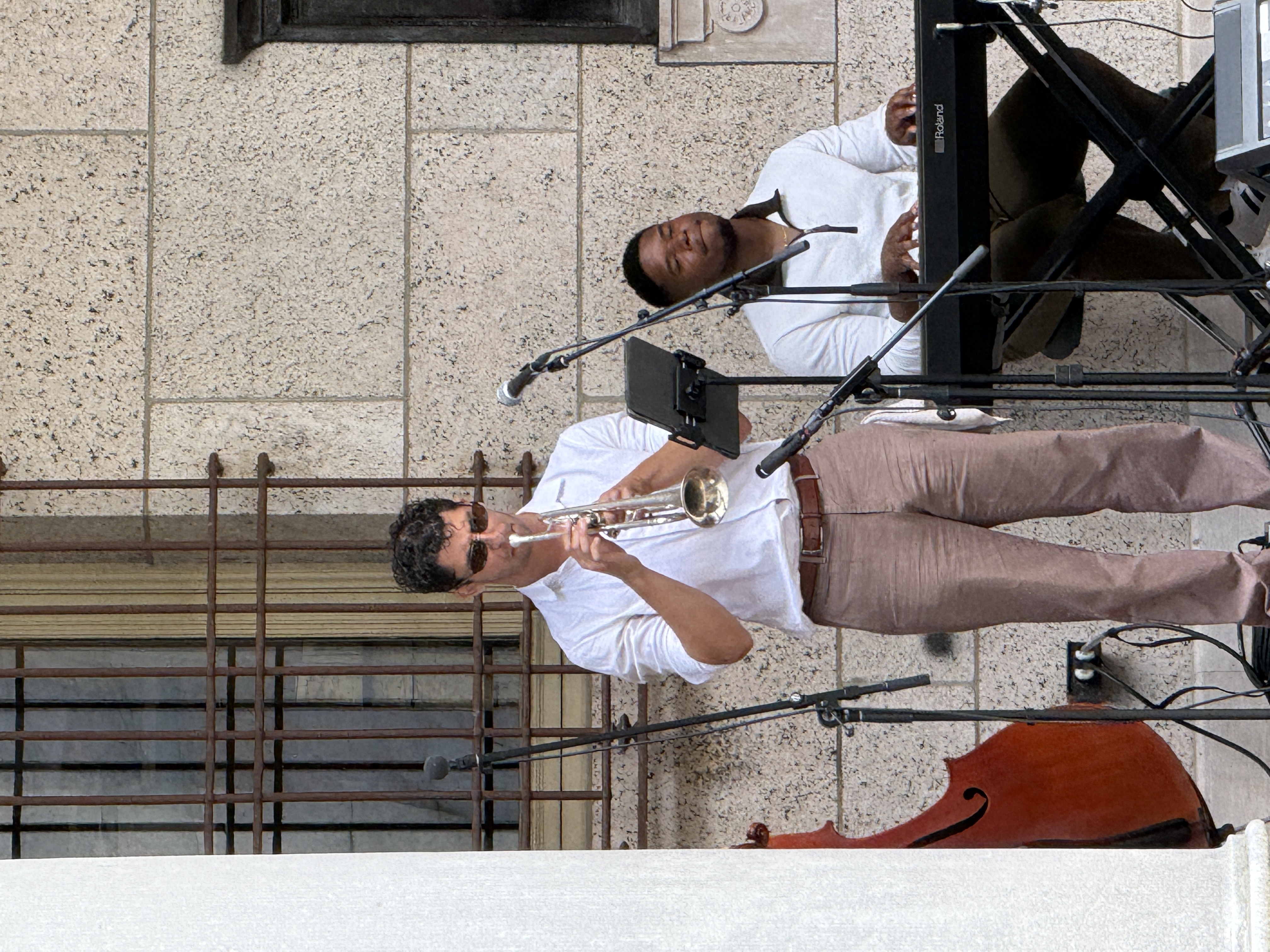 John Glennon on trumpet alongside keyboardist at Boston Public Library Main Branch Courtyard