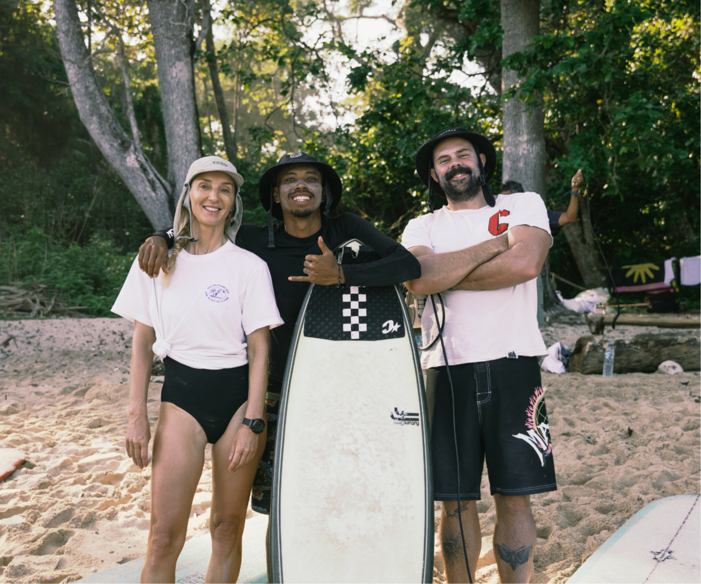surfer girls cheering in the water, Overcoming-Fear-Surfing-Mindset-Tips