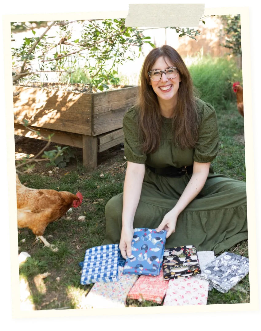 Stacie Bloomfield in her studio with her chicken fabric collection