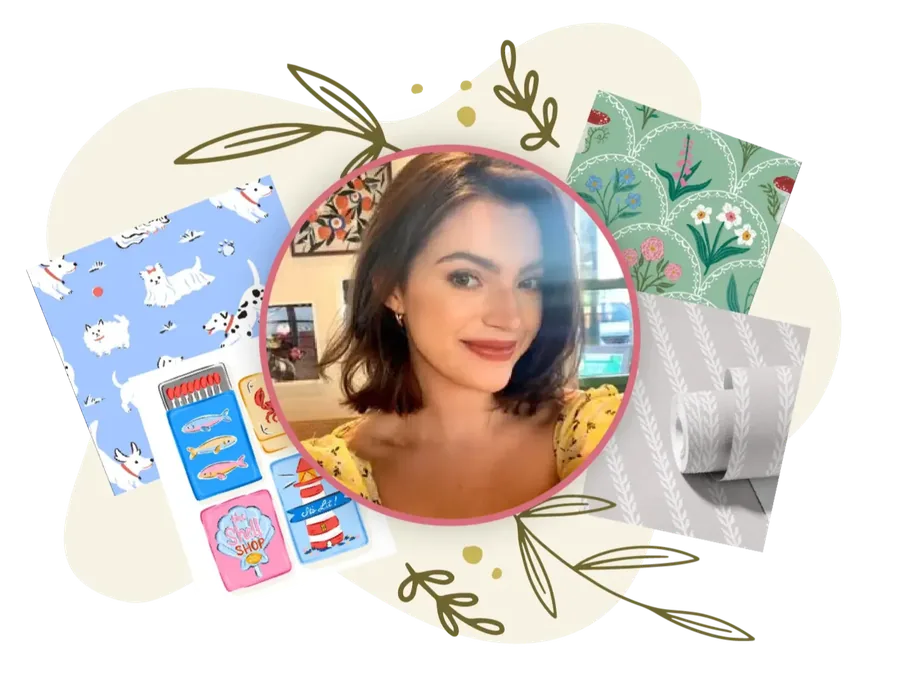 Katelynn Fluellen surrounded by examples of her artwork and products
