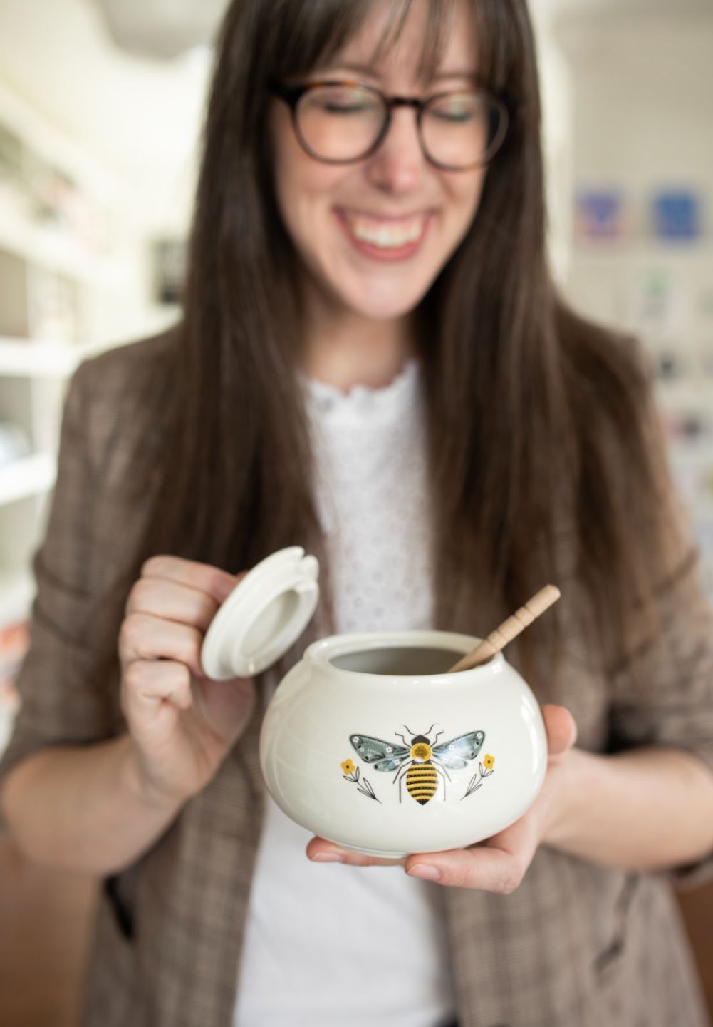Stacie Bloomfield holding a licensed product