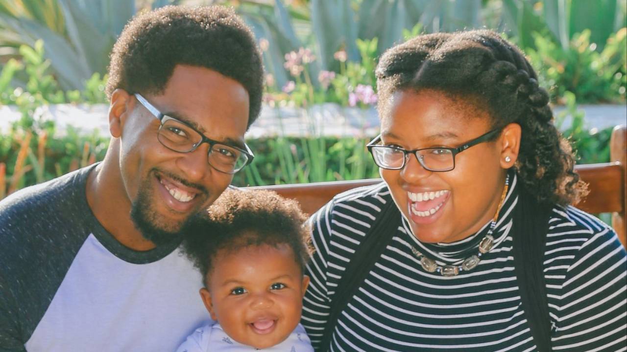 Young Black couple with baby