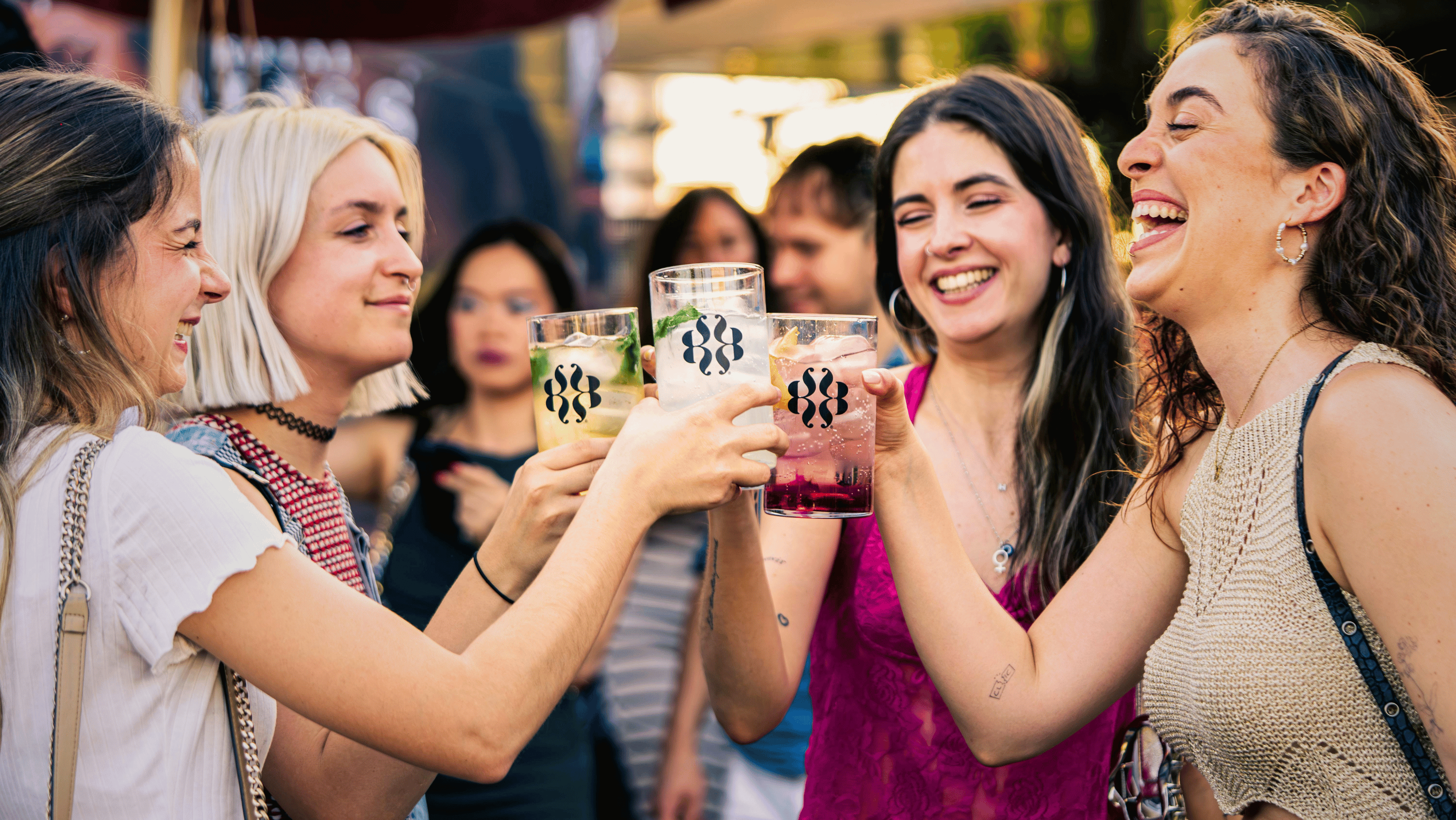 A group of people at a social event in a round drinking more than they had planned