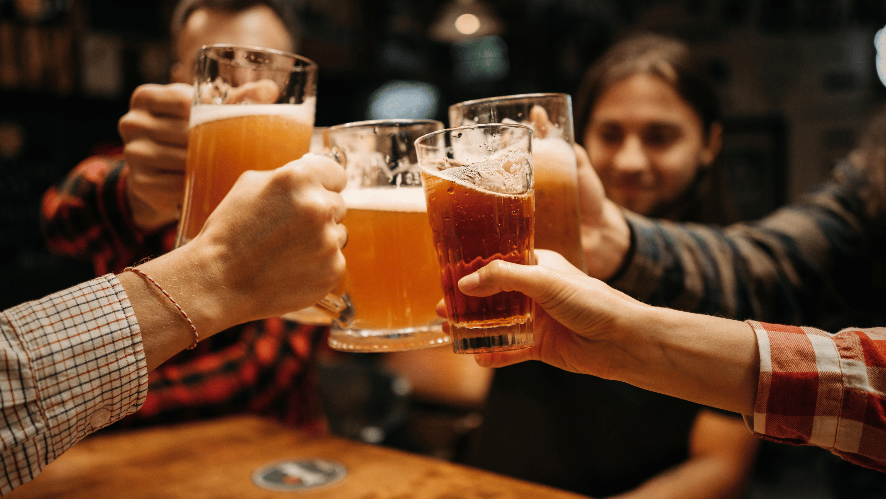 A group of people binge drinking at the weekend.
