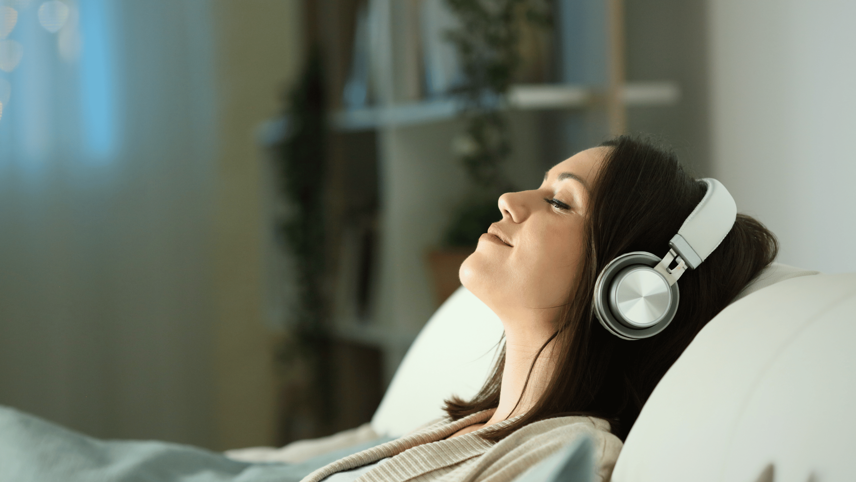 Girl relaxing and listening to hypnotherapy recordings from Drink Less Live Well Blueprint