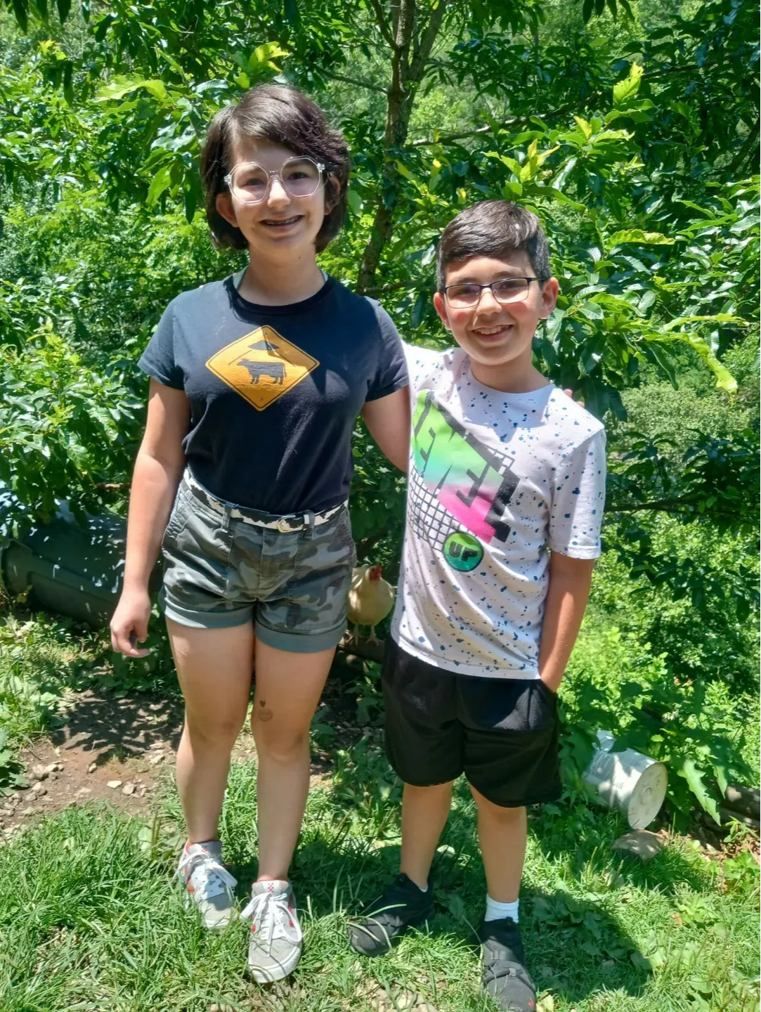 Linda's homeschool children, both Maestro Music students, outdoors