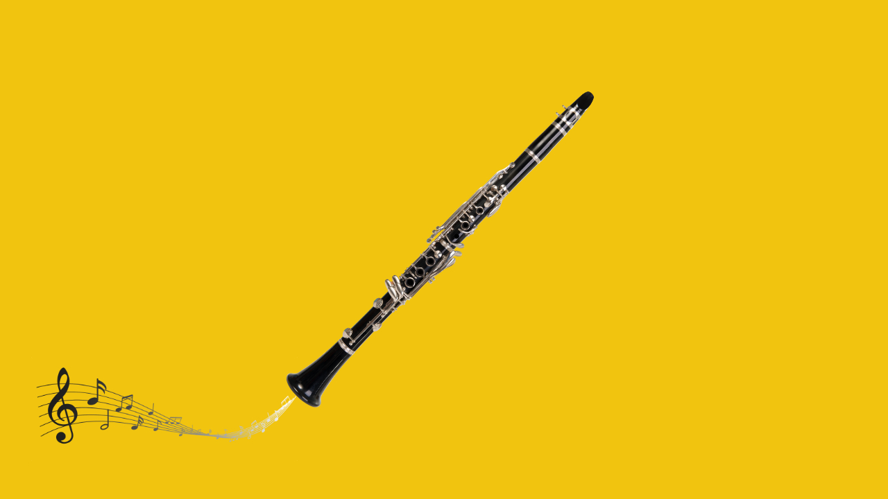 Picture of a black clarinet with a music scale and notes on a yellow background