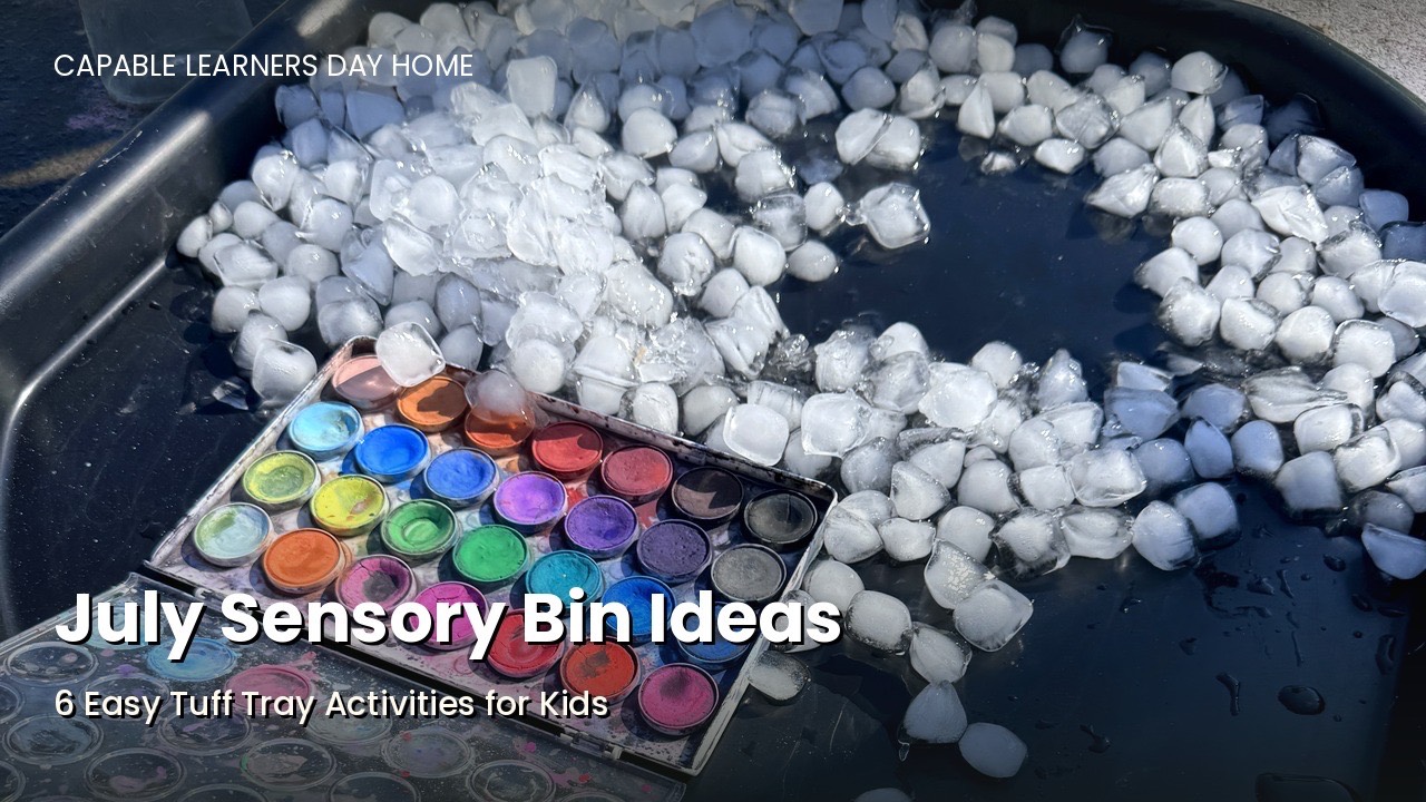 summer tuff tray with lemon and lime slices, ice, and toy citrus juicers garden themed sensory bin with dried beans, wooden flowers, and Grimm's loose parts