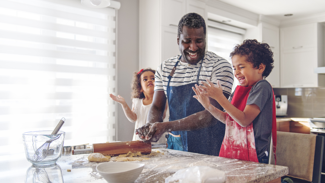 dad in the kitchen with kids