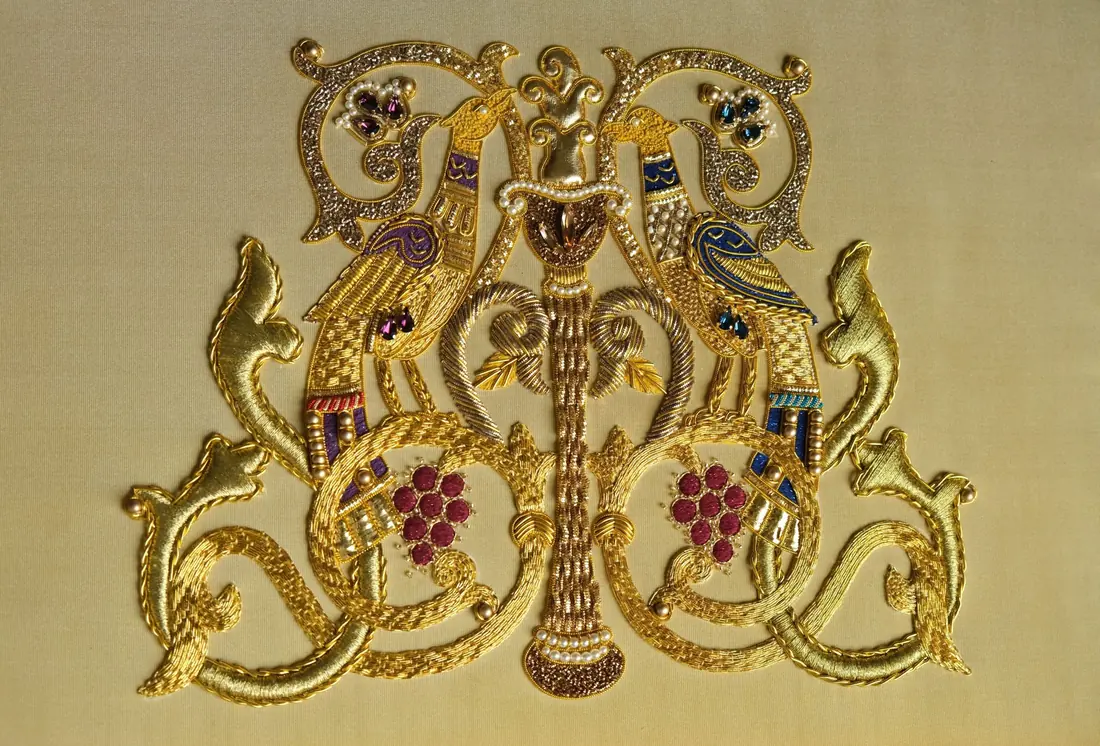 Full goldwork main project on cream silk taffeta with symmetrical birds, grapes, pearls and gold scrollwork