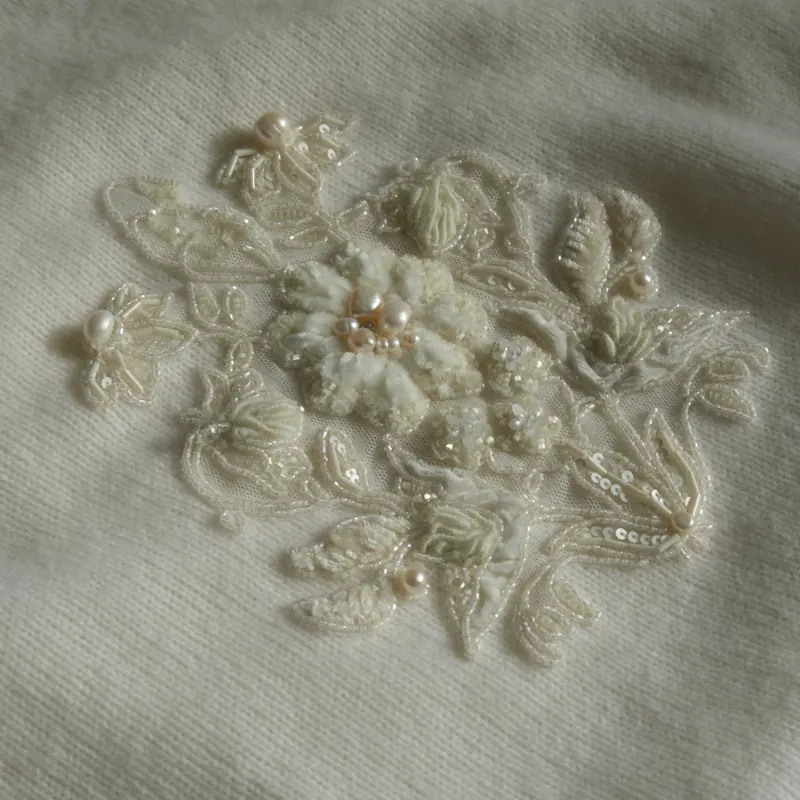 Hand-beaded couture embroidery detail, student work, tambour technique