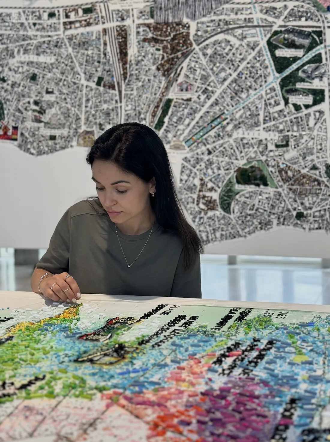 Valeria Fic embroidering an art piece