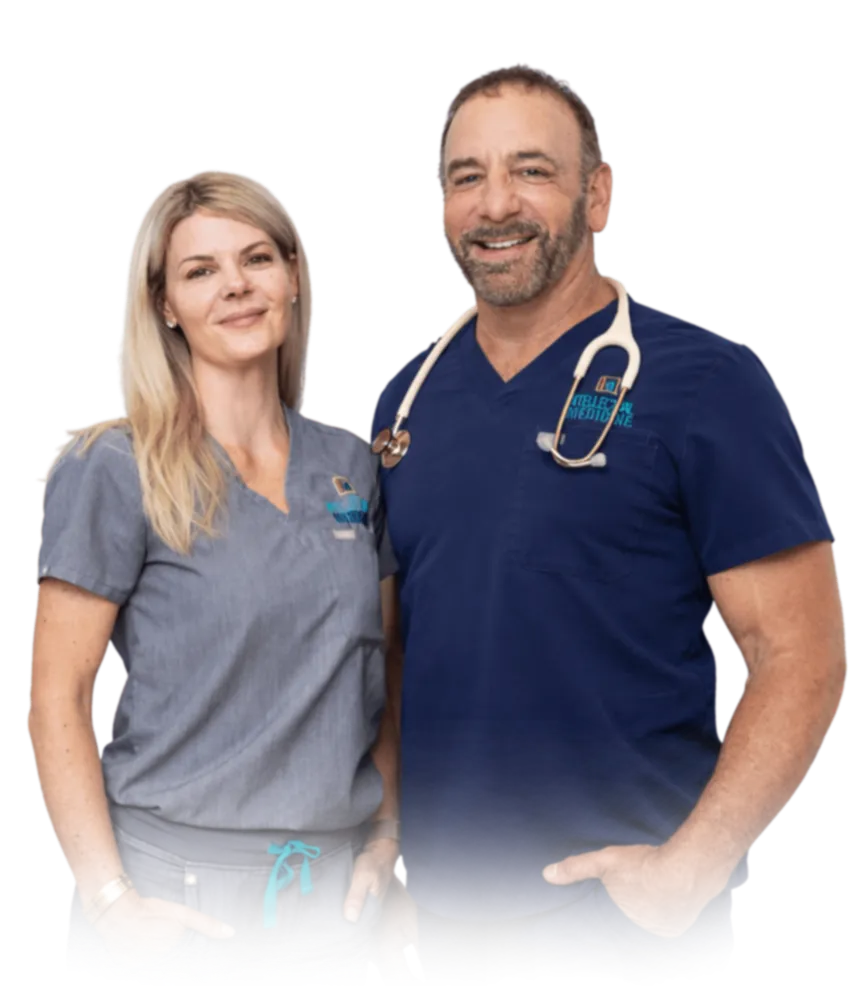 Dr. Petteruti and Shannon smiling. Dr. Petteruti is wearing a stethoscope.