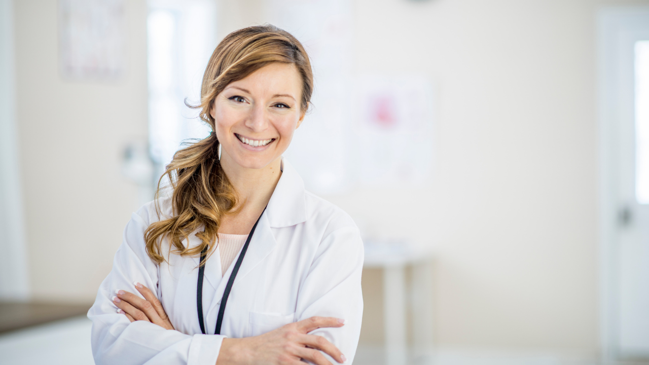 Nurse Practitioner standing in her new Functional Medicine office
