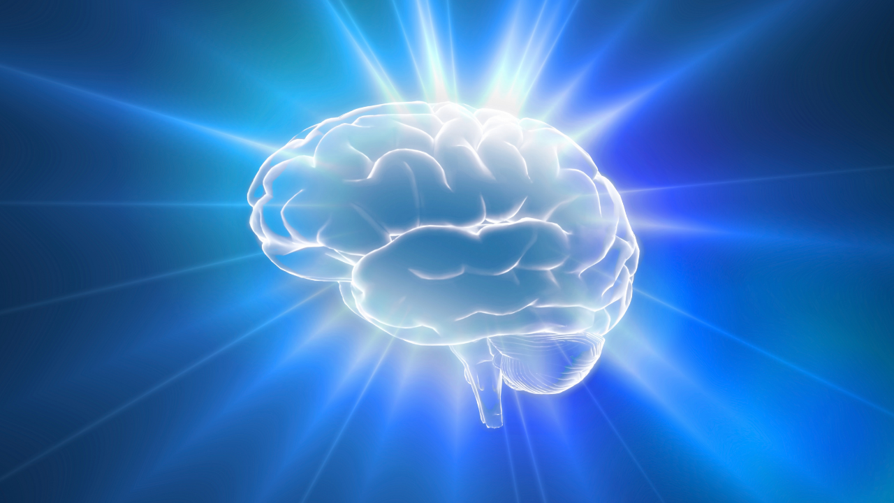 Glowing brain illustration representing cognitive function, mental clarity, and neurological support from NAD+ therapy
