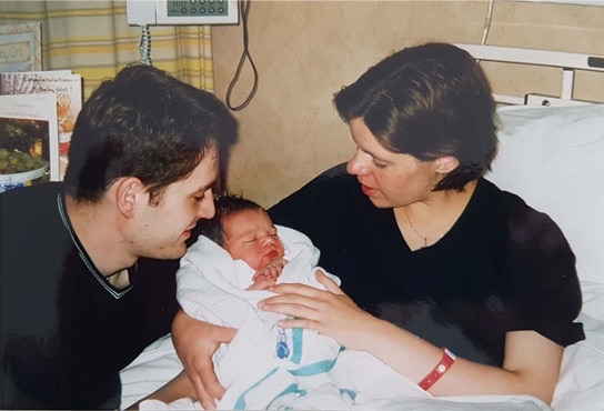 Kate and Justin with their eldest daughter on the day she was born