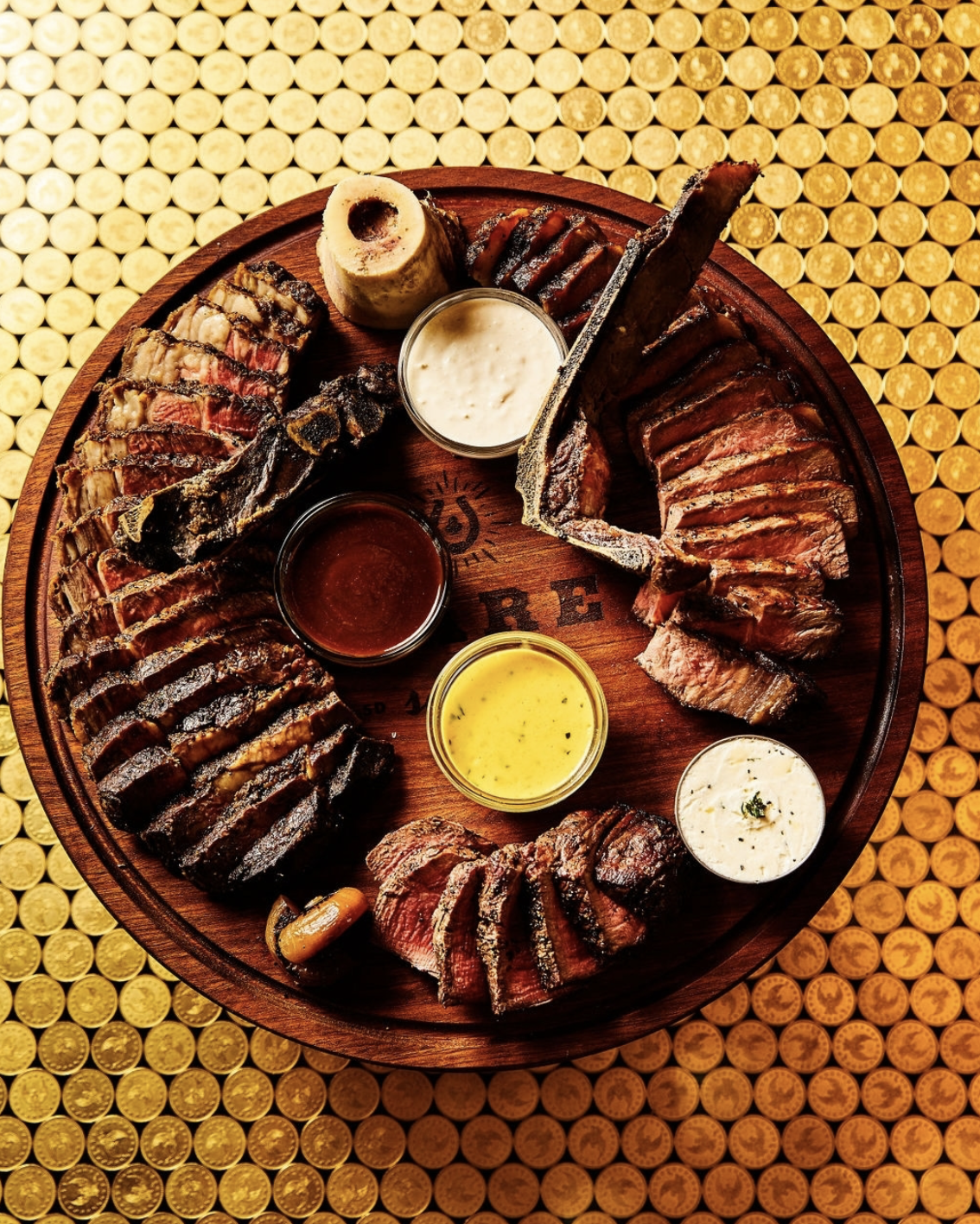 Wooden Board of Sliced and Dry Aged Meats