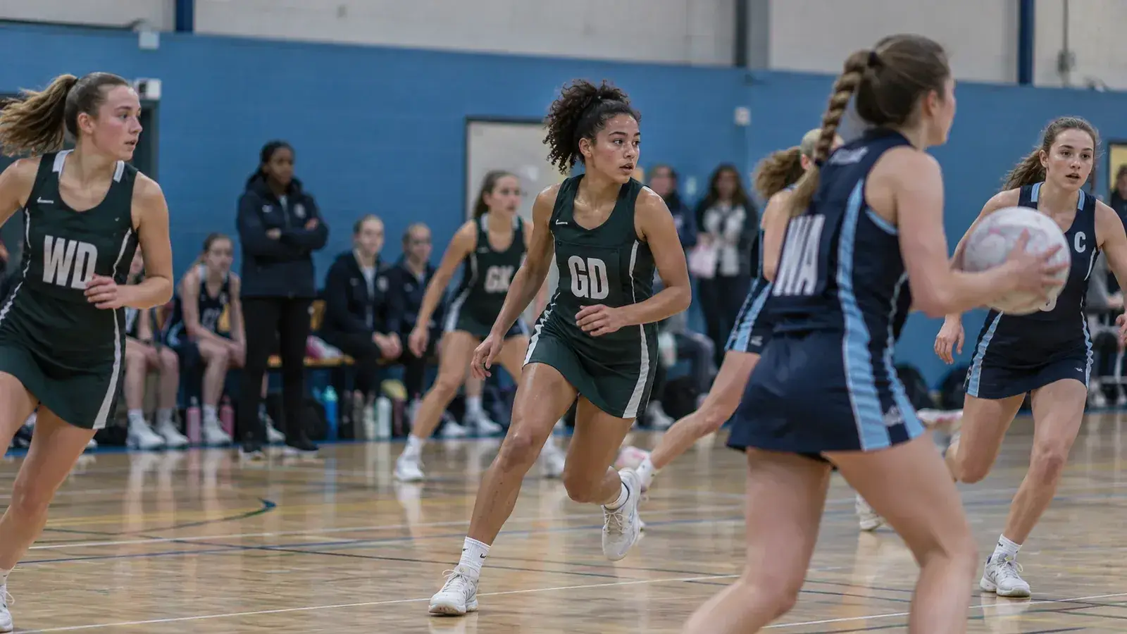 Netball player under pressure in a match
