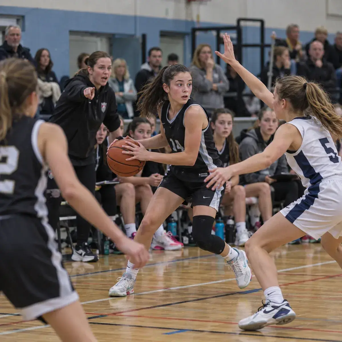 Youth basketball player under pressure during a match