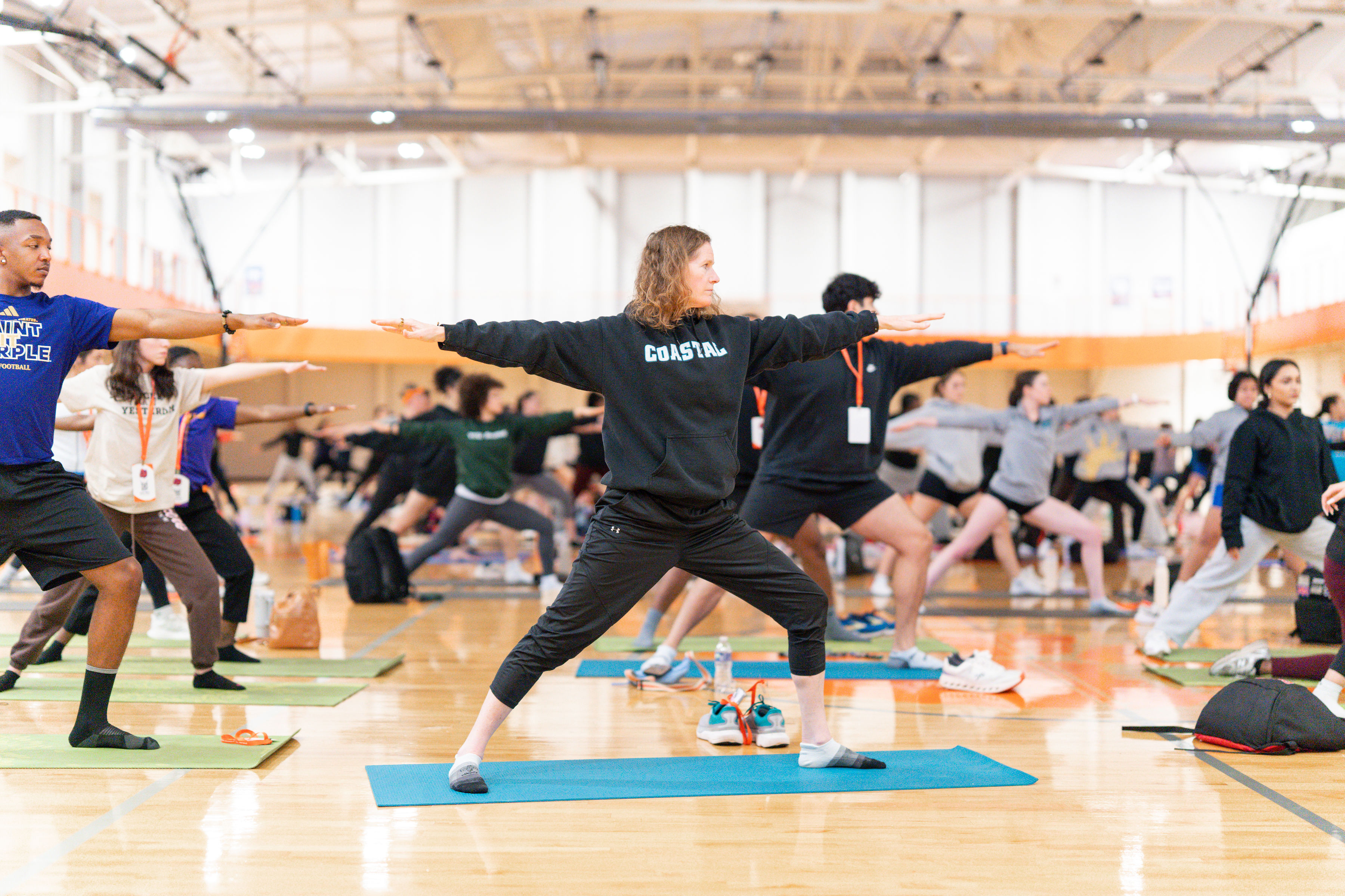 Group fitness class in session at FitExpo