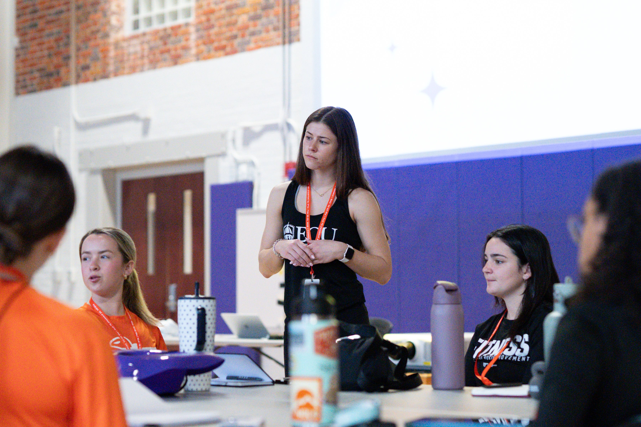 Attendees connecting between sessions at a Collegiate Fit experience