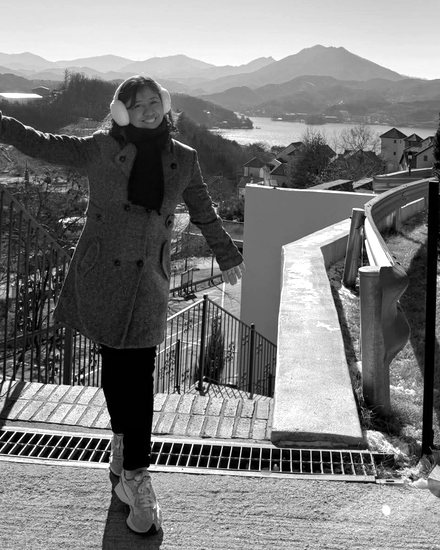 Jackie smiling on a winter trip in South Korea