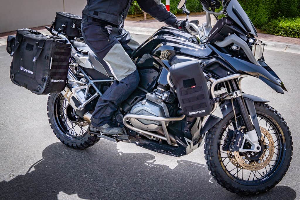 BMW R1200GS LC on asphalt with close-up of Lone Rider luggage