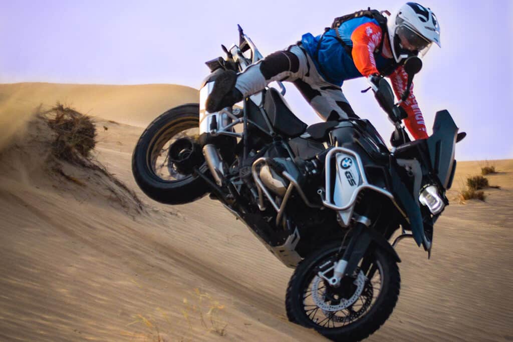 BMW R1200GS landing badly after a jump in the sand