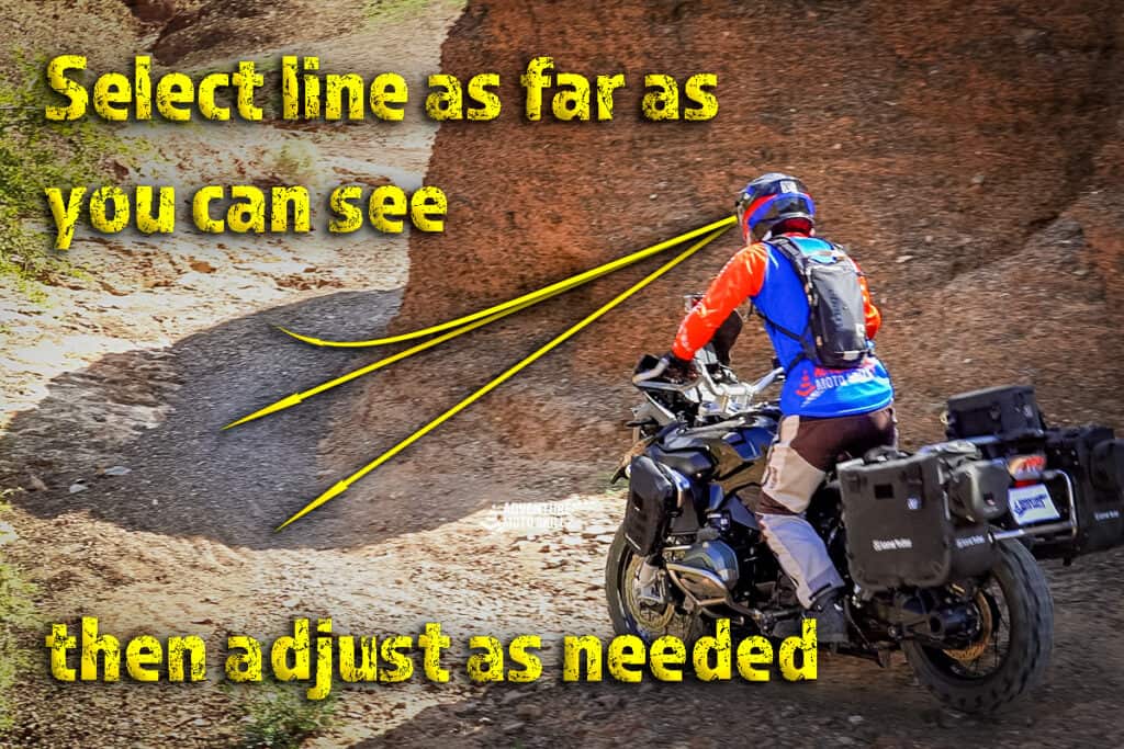 Adventure motorcyclist riding around an off-road corner