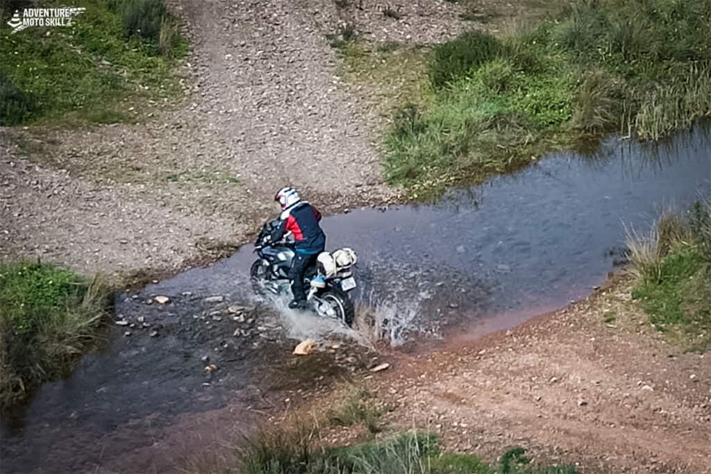 BMW adventure motorcycle water crossing with Motoxplorers