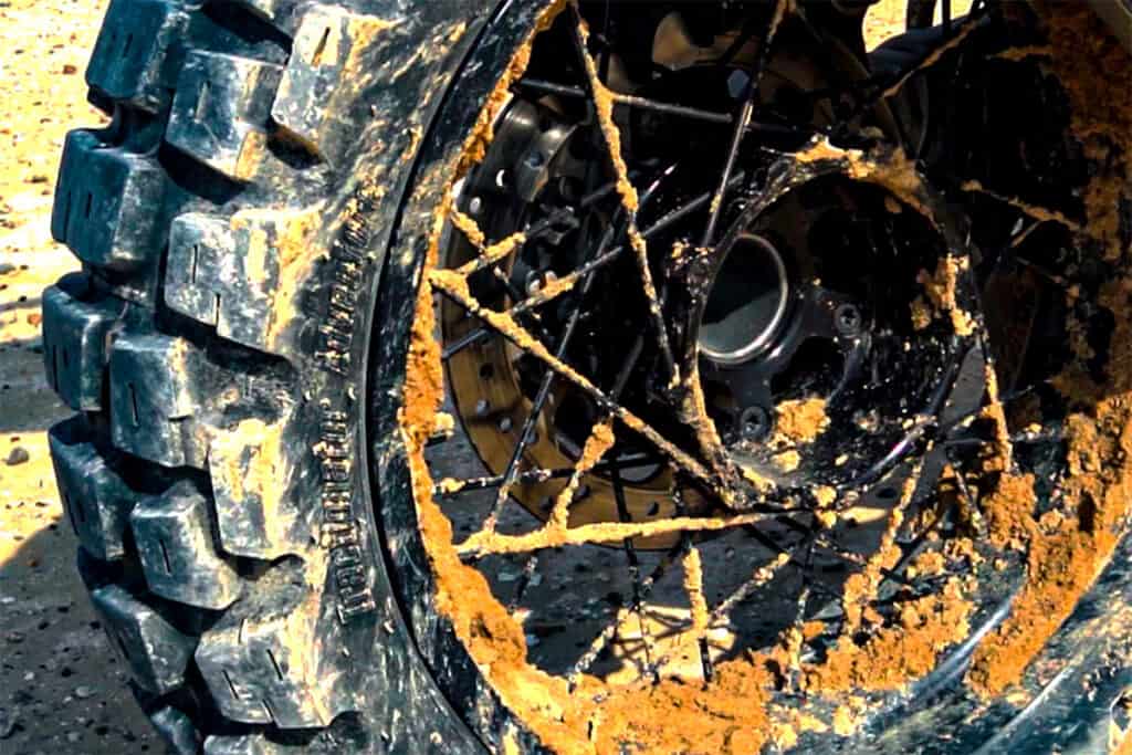 Muddy adventure motorcycle tire