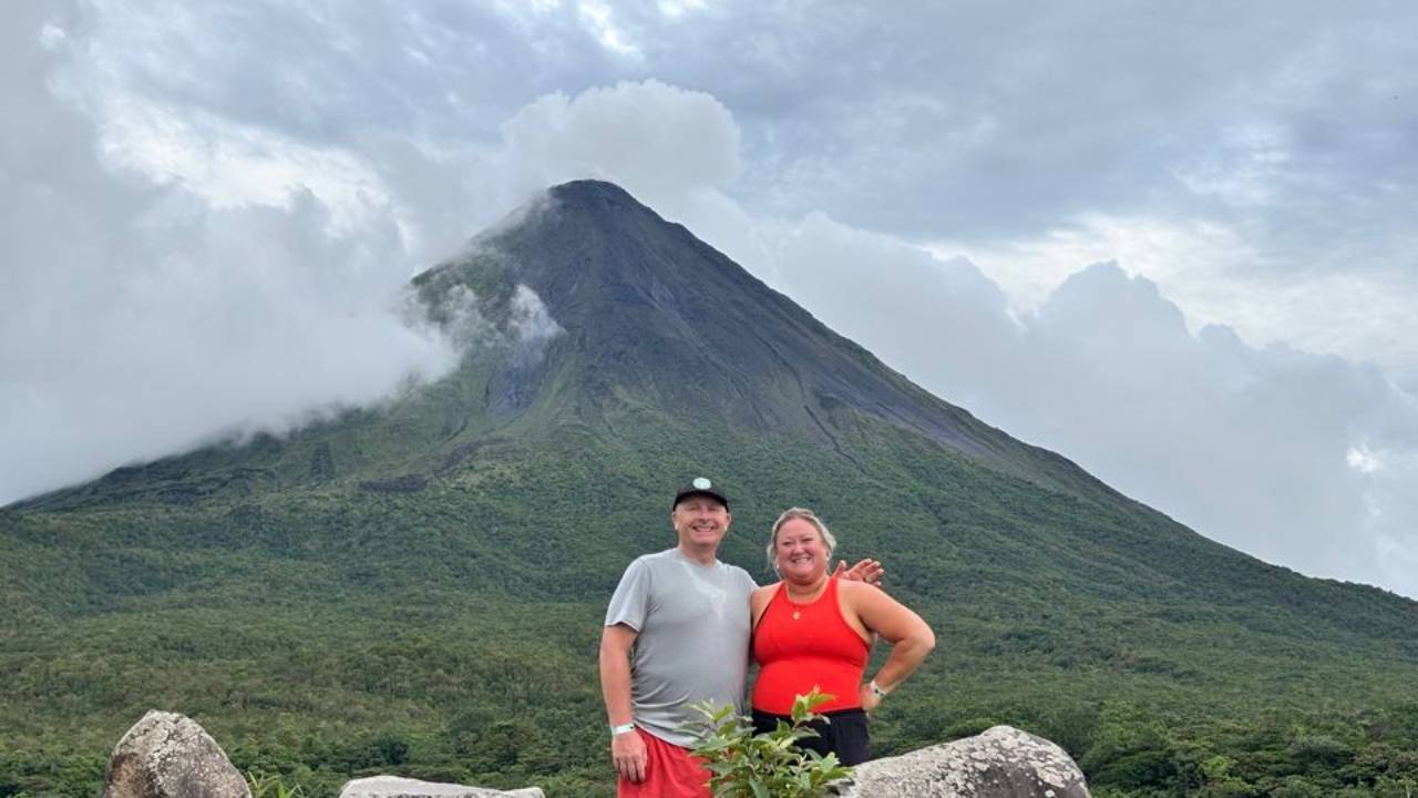 Erin and Joe Liberty in front of Arenal Volcano, Costa Rica