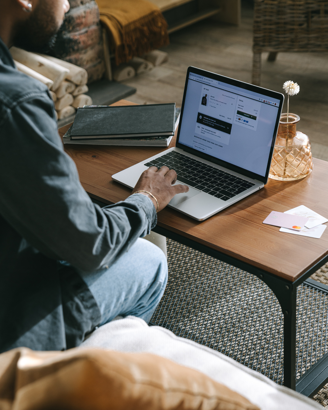 Man in red and white using his laptop, building something that pays