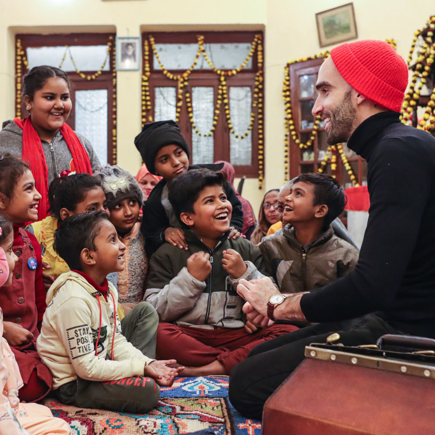 magician dmc performing card magic for young indian kids