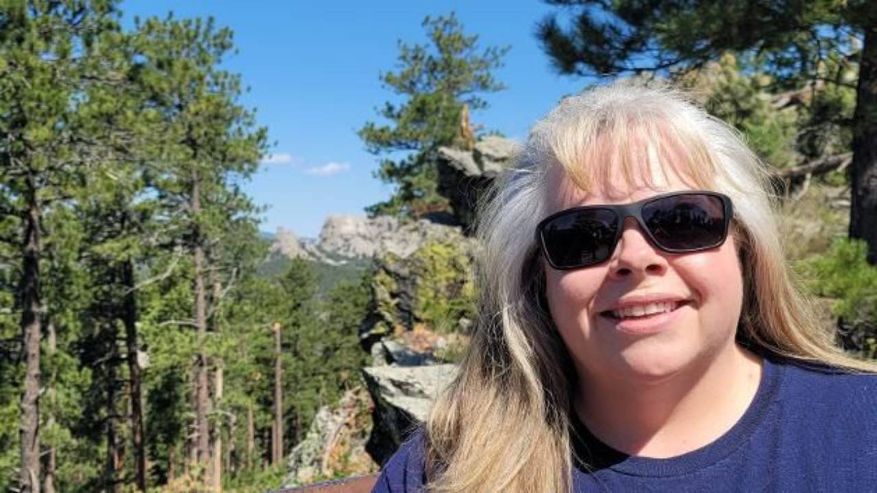 Karen in front of mountains