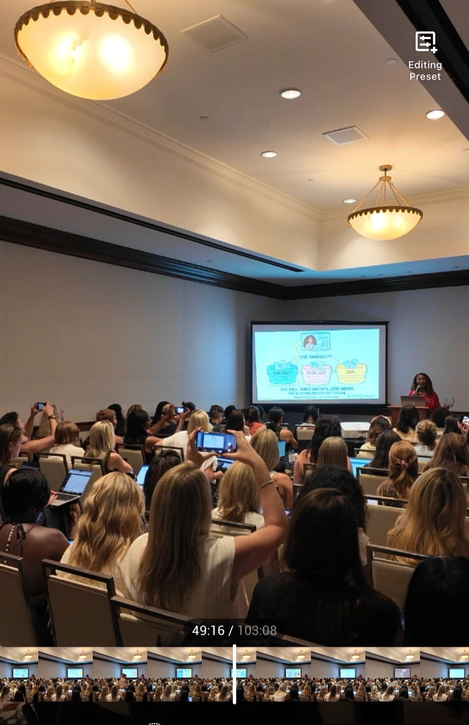 A full InvestHERCon workshop room following Dr. Rachel Gainsbrugh's live AI build