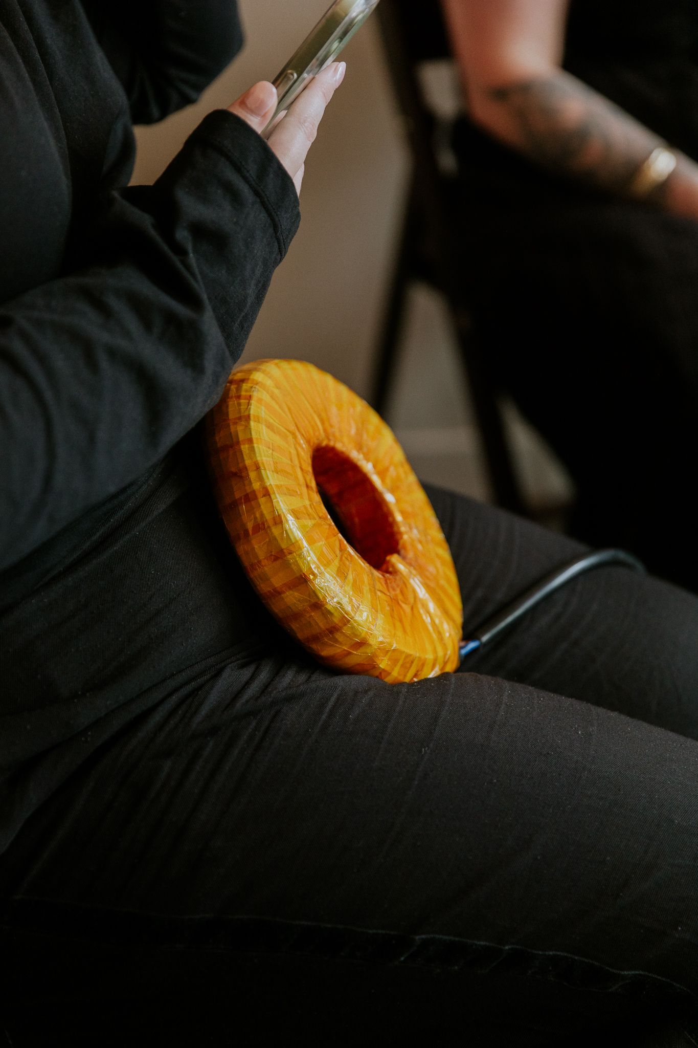 AmpCoil sound and frequency device in use during a retreat session