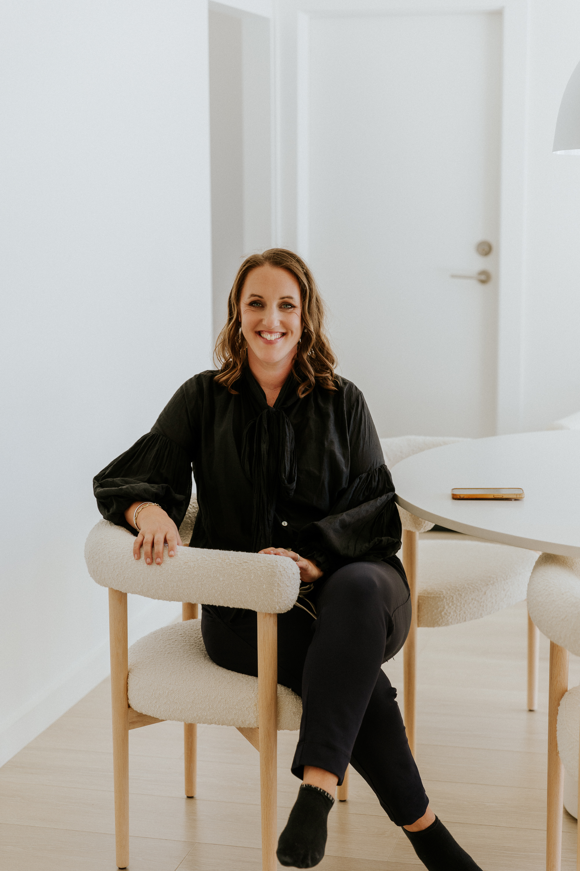 Shelley Gawith speaking with a client