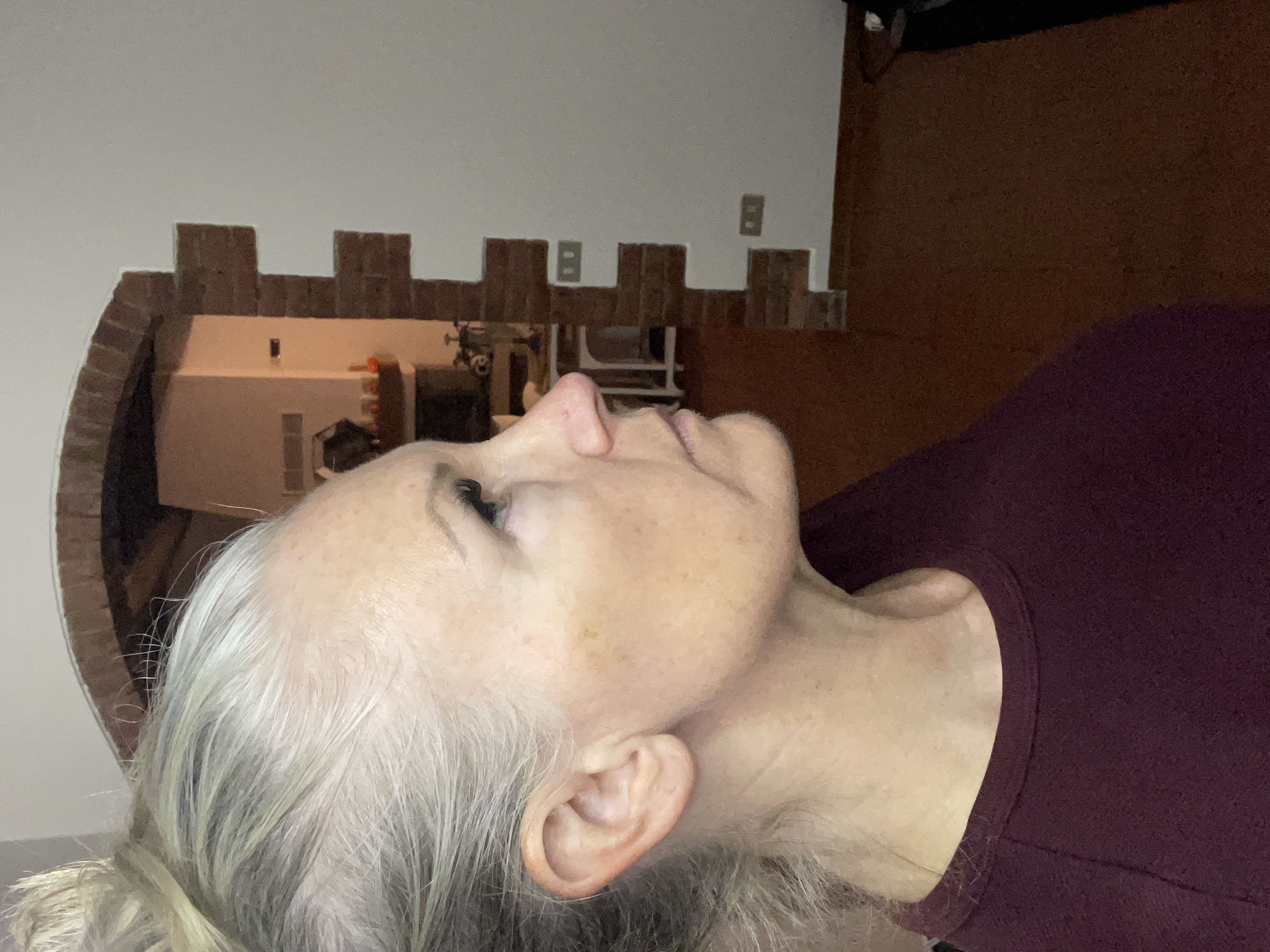 Liz, side profile, showing a smoother neck and jawline