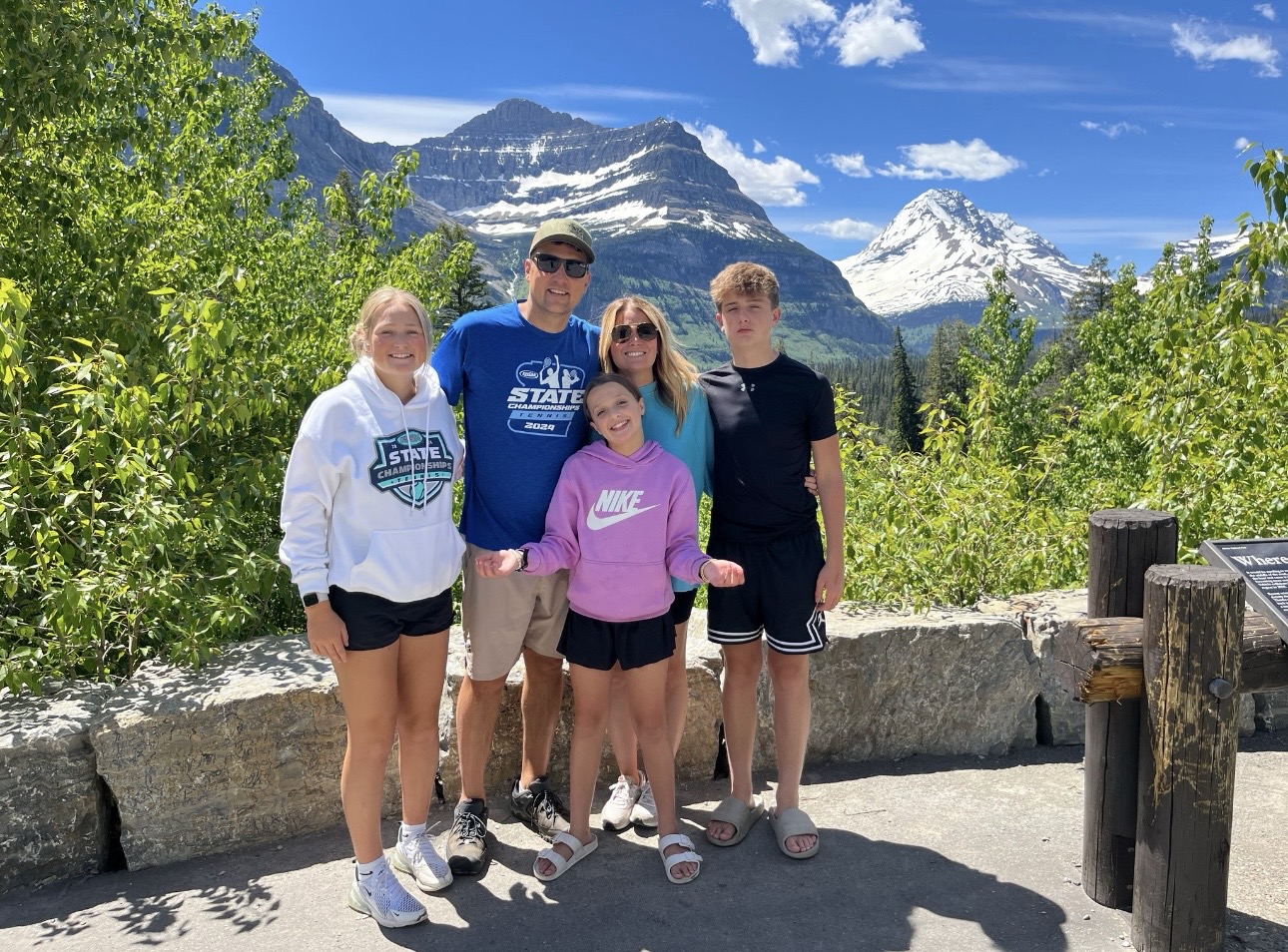 Jess with her family in the mountains