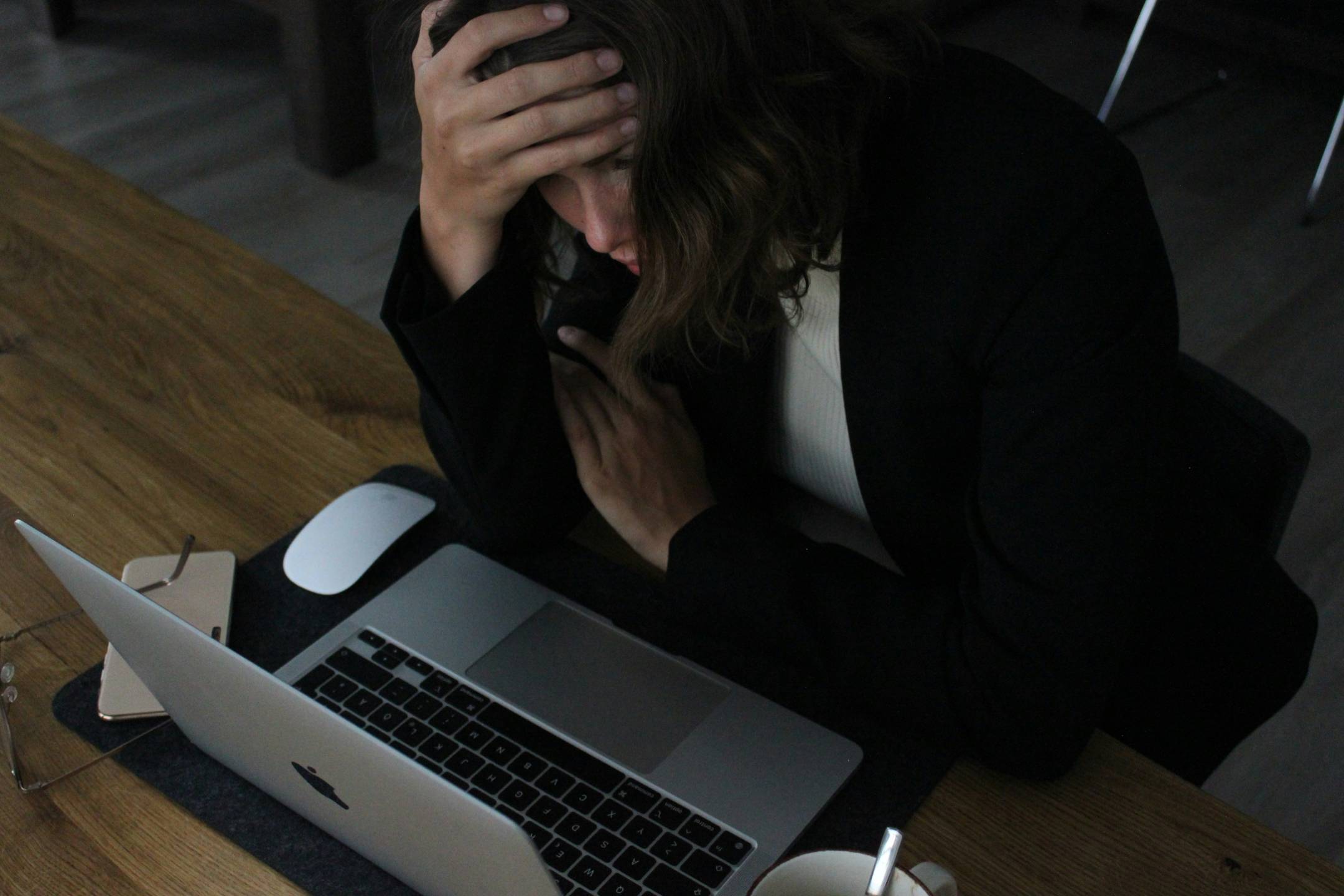 Woman scrolling her phone late at night