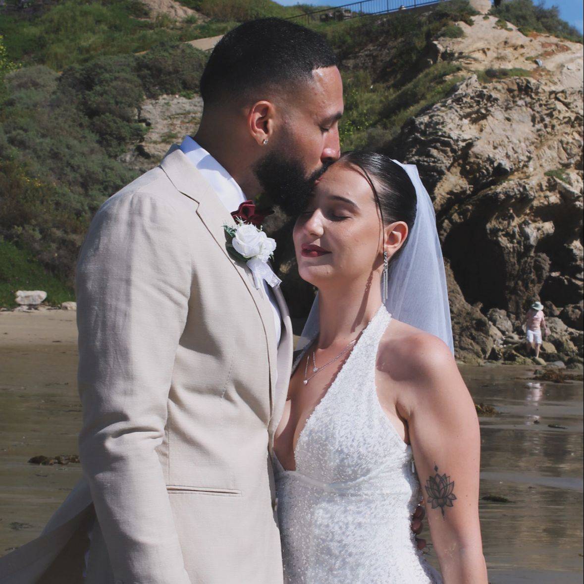 Kyra and her husband on their wedding day