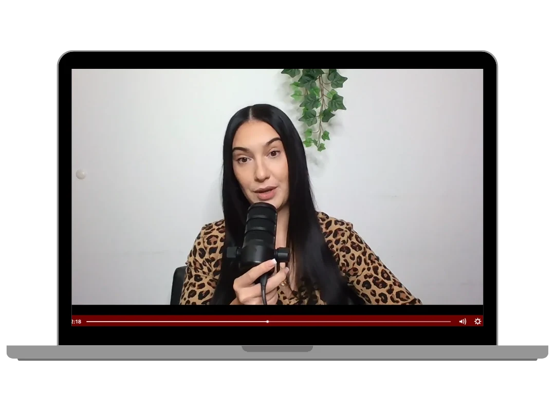 Kyra recording a video on a laptop screen